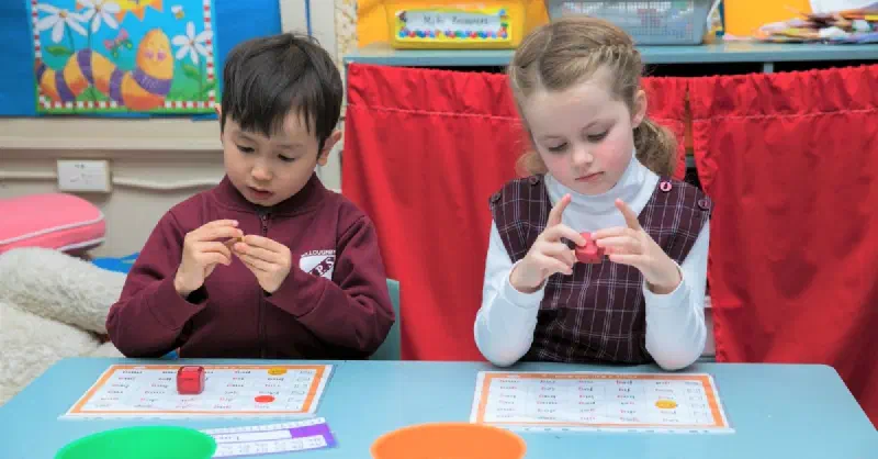 Children with hands-on learning in classroom